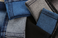 پارچه جناغی جین کشدار پود رنگی 59 اینچی با رنگ مخلوط سیاه آبی سفید در پشت